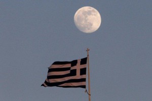 A Greek flag flutters